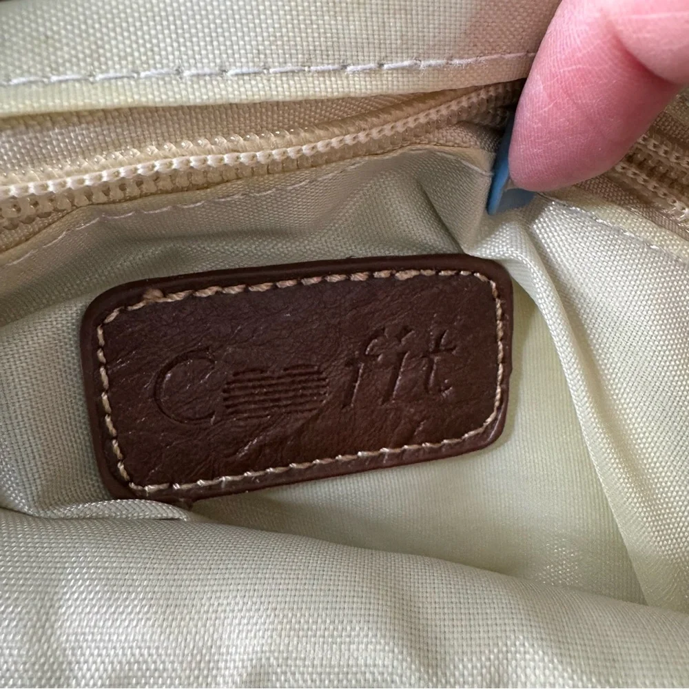 Brown Leather Backpack with Gold Accents